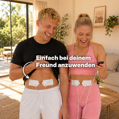 Perioden Simulator für Männer: Paar wendet die TENS-Elektroden des Perioden Simulators am Bauch des Mannes an